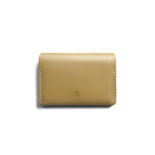 Bellroy Under Cover card sleeve in tan leather with embossed owl logo and neat stitching detail