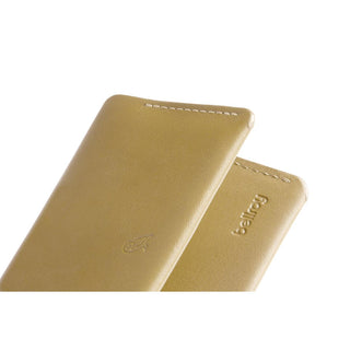 Bellroy Under Cover leather card sleeve in tan with embossed logo and white stitching detail