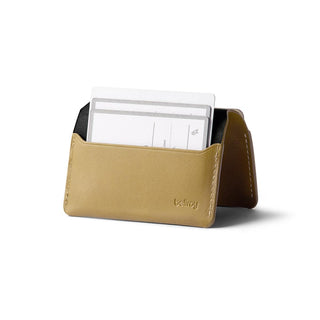 Bellroy Under Cover cardholder in tan leather with visible card slots and embossed logo detail