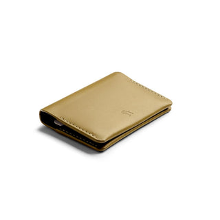 Bellroy Under Cover slim tan leather card holder with smooth texture and stitched edges