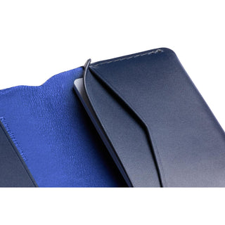 Bellroy Under Cover card sleeve in navy leather with smooth texture and contrasting blue interior lining