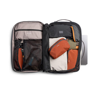 Bellroy Lite Travel Pack 38L open flat showing organized packing with travel pouches and compartments