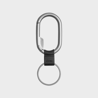 Orbitkey Clip Mini key holder with silver zinc alloy clip and black leather detail on white background