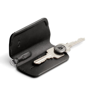 Bellroy Key Cover Third Edition in black leather showcasing key organizer with two keys inside
