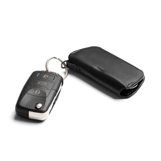 Bellroy Key Cover Third Edition in black leather with compact, smooth finish and attached car key ring