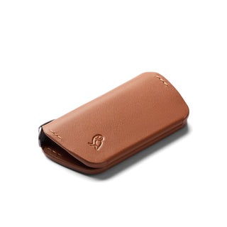Bellroy Key Cover Third Edition in tan leather with embossed logo and stitched edges, angled view on white background