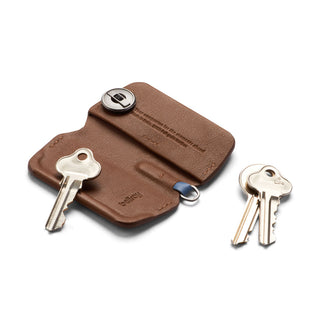 Bellroy Key Cover Third Edition in brown leather with stainless steel keys and button closure detail