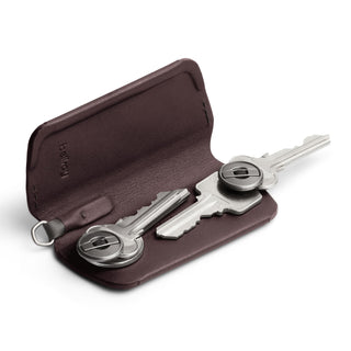 Bellroy Key Cover Plus Third Edition in dark brown leather holding two silver keys inside