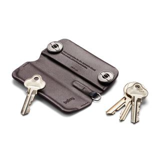 Bellroy Key Cover Plus Third Edition dark brown leather key organizer with metal button closures and keys