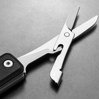 James The Ellis Scissors Knife showing polished stainless steel blades with black textured handle by The James Brand