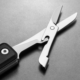 James The Ellis Scissors Knife by The James Brand showing polished stainless steel scissors detail and black Micarta handle