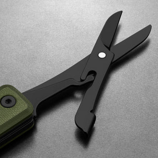 James The Ellis Scissors Knife showing black steel scissors with green Micarta handle close-up