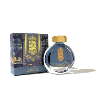 Storied Blue | 38ml Ink | Ferris Wheel Press, round ink bottle with illustrated packaging