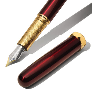 The Bijou Fountain Pen - Ambrosia Indulgence | Ferris Wheel Press with deep red brass body and ornate gold nib section