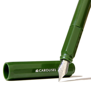 The Carousel Fountain Pen - Brilliant Beanstalk | Ferris Wheel Press with green resin body and silver nib close-up
