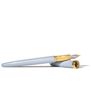 The Bijou Fountain Pen - Forget Me Not | Ferris Wheel Press with pale blue body and gold nib details lying open