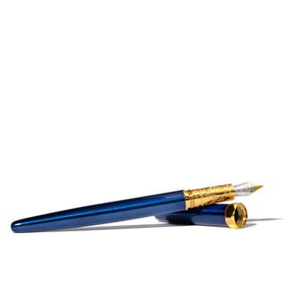The Bijou Fountain Pen - Luna Celeste | Ferris Wheel Press with sapphire lacquer and gold accents angled writing view