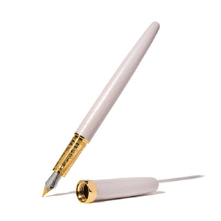 The Bijou Fountain Pen - Sandcastle Clay | Ferris Wheel Press with gold accents and fine nib angled on white