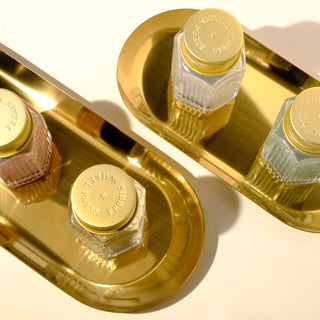 28ml Calligraphy Ink - Borrowed Blue | Ferris Wheel Press glass bottle with gold cap on shiny gold tray