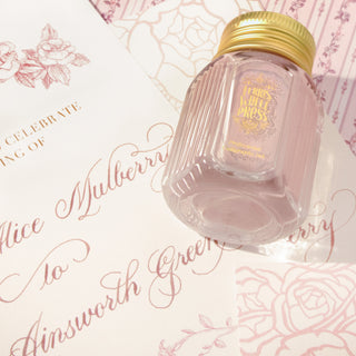 28ml Calligraphy Ink - Sweetbriar Rose | Ferris Wheel Press glass jar with pink ink on calligraphy paper