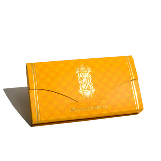 The Carousel Fountain Pen Converter Set | Ferris Wheel Press packaging in bright yellow with white logo and text