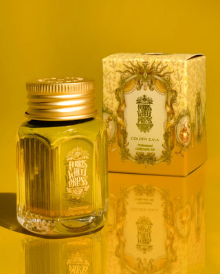 28ml Calligraphy Ink - Golden Gala | Ferris Wheel Press glass bottle with ornate gold packaging on yellow background