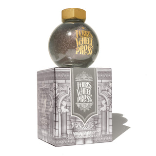 Granite Guardians | 85ml Ink | Ferris Wheel Press in round glass bottle with gold cap on decorative box