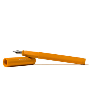 The Carousel Fountain Pen - Hearty Harvest | Ferris Wheel Press orange resin body with silver nib lying horizontally