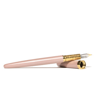 The Bijou Fountain Pen - Huffin Puff Pink | Ferris Wheel Press with brass grip and fine nib angled side view