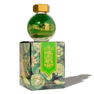 Lores of the Loch | 20ml Ink | Ferris Wheel Press green shimmering ink bottle with gold cap on floral box