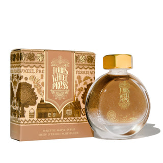Majestic Maple Syrup | 38ml Ink | Ferris Wheel Press round glass bottle with gold cap beside decorative box