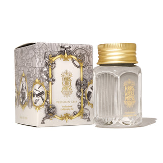 28ml Calligraphy Ink - Pressman Grey | Ferris Wheel Press in clear ribbed glass bottle with gold cap next to ornate box