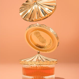 The Carousel Inkwell™ - Sunset Gold by Ferris Wheel Press showing reflective gold lid details and textured glass body