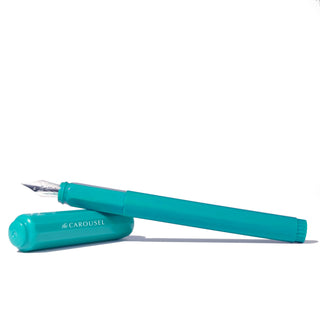 The Carousel Fountain Pen - Tumultuous Tides | Ferris Wheel Press in vibrant teal with silver nib angled side view