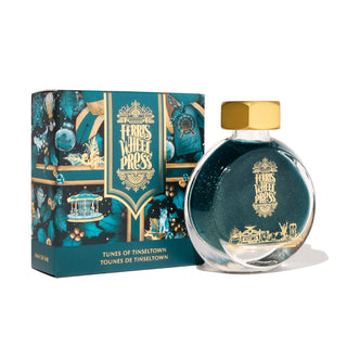 Tunes of Tinseltown | 38ml Ink | Ferris Wheel Press ink bottle with teal and gold festive packaging