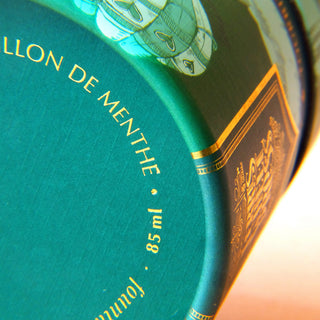 Close-up of teal label with gold lettering on Peppermint Drop | 85ml Ink | Ferris Wheel Press bottle
