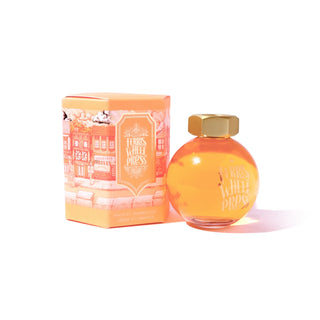 Main St. Marmalade | 85ml Ink | Ferris Wheel Press round amber glass bottle with gold cap and orange packaging