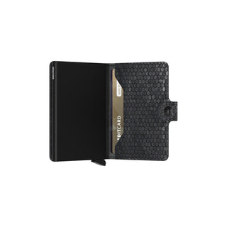 Secrid Miniwallet Hexagon with black hexagonal leather texture and open cardholder design
