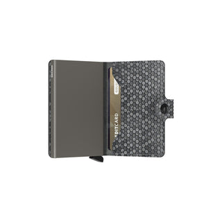 Secrid Miniwallet Hexagon open showing grey hexagon textured leather and metallic card protector inside