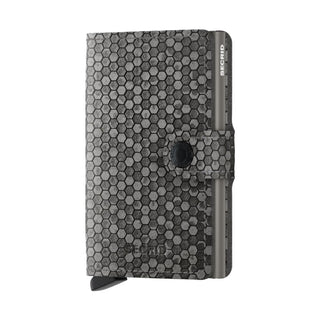 Secrid Miniwallet Hexagon in grey leather with hexagon pattern and metal card protector visible on side