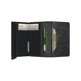 Secrid Slimwallet Hexagon in black leather with hexagonal texture open showing cards and banknotes