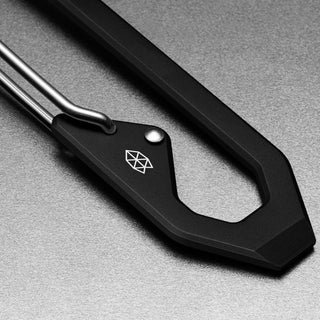James The Holcombe Carabiner in black with etched logo and stainless steel spring latch detail