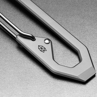James The Holcombe Carabiner in titanium with angular design and spring-loaded latch by The James Brand