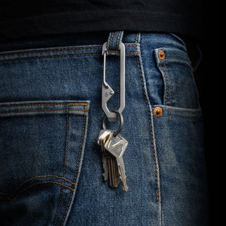 James The Holcombe Carabiner in stainless steel clipped to jeans belt loop holding keys securely