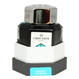 Caran d'Ache Fountain Pen Ink Bottle 50 ml with metal cap and turquoise label in hexagonal glass bottle