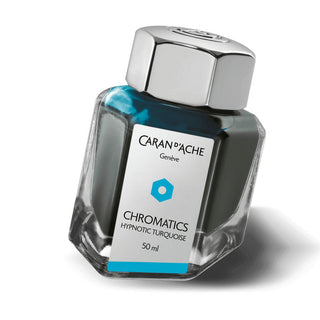 Caran d’Ache Fountain Pen Ink Bottle 50 ml in turquoise hexagonal glass with metal cap