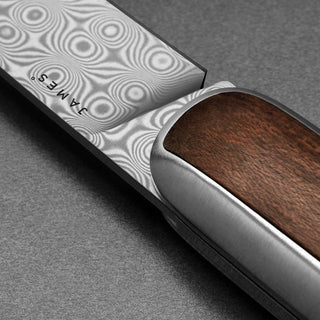James The Pike Knife with patterned blade and smooth rosewood handle close-up angled view