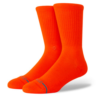 Bright orange STANCE ICON CREW SOCKS made from soft combed cotton with ribbed texture and crew length design