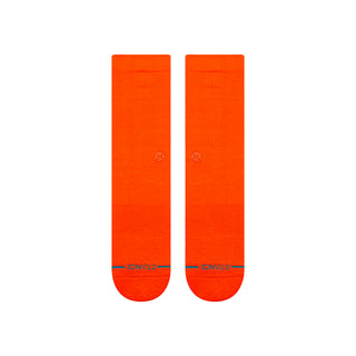 Bright orange STANCE ICON CREW SOCKS with soft cotton blend fabric and subtle logo near toes