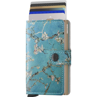 Secrid Miniwallet Art in blue Italian leather with floral print and cards partially visible in tray